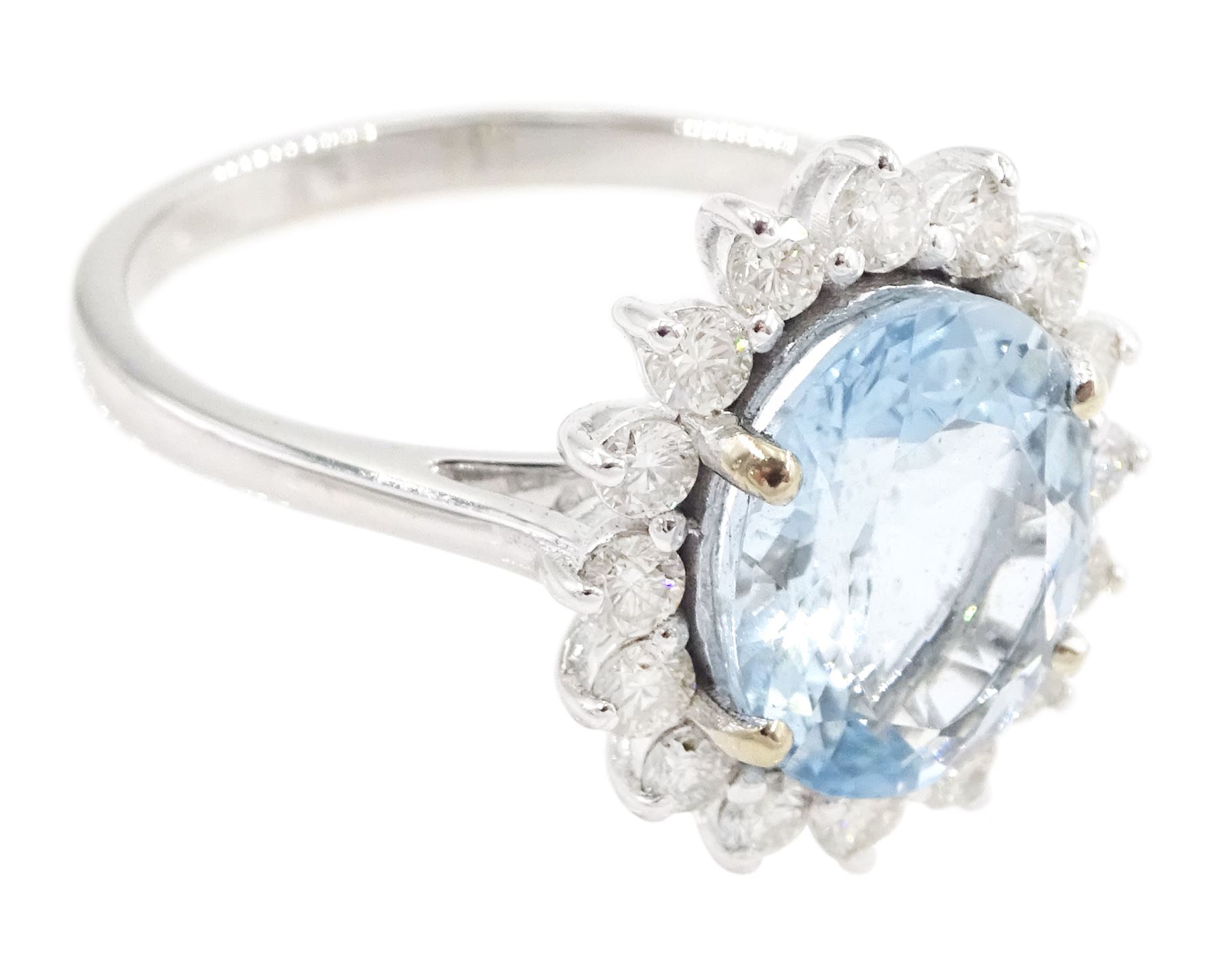18ct white gold oval cut aquamarine and round brilliant cut diamond cluster ring, aquamarine approx 2.15 carat, total diamond weight approx 0.50 carat