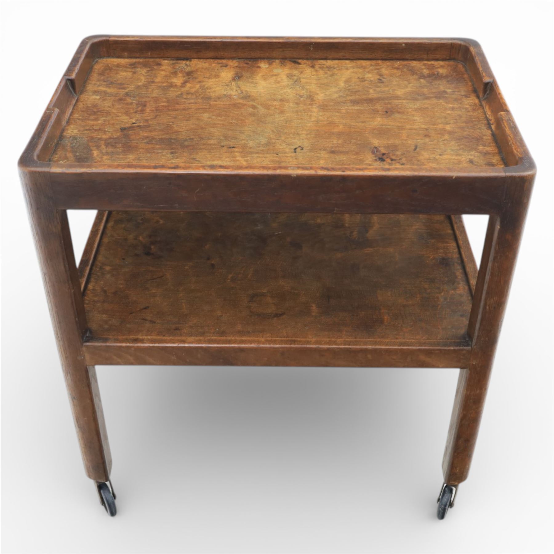 Yorkshire oak dark stained tea trolley, adzed two tier table, raised on castors