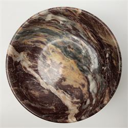 Pink veined marble bowl, of circular form, upon a spreading circular foot, D22cm H12cm