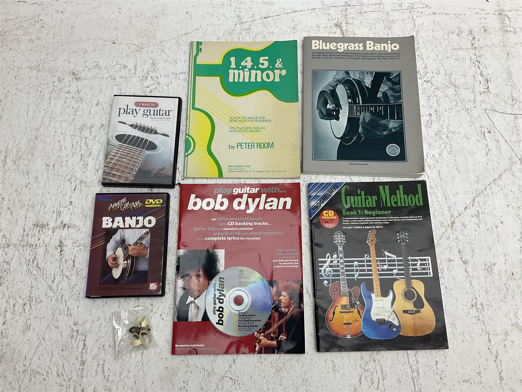 Rally five-string banjo with mahogany solid back L101cm in soft carrying case; and Brunswick Model BF200 acoustic guitar L103cm; with small quantity of instructional DVDs and booklets