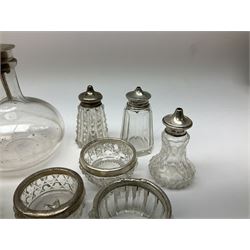Group of silver mounted glass bottles and open salts, a number with octagonal and hobnail cut decoration, various hallmarks, mostly London and Birmingham. 