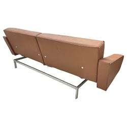 Mid-20th century large three-seat sofa bed, hinged and folding back cushions, upholstered in leather, on chromed metal base