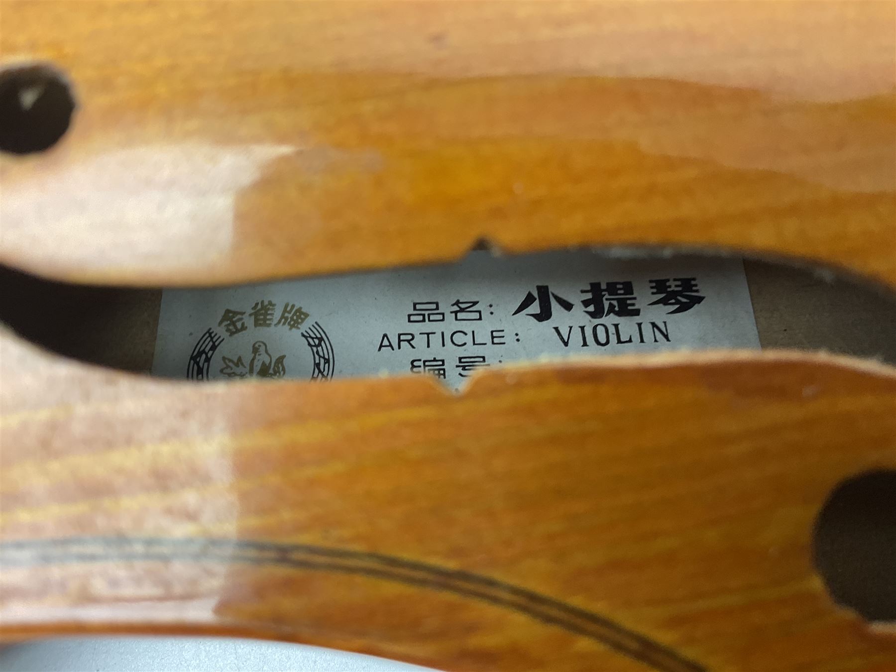 Four student violins - two Chinese three-quarter size with 33.5cm and 34cm two-piece backs; Stringers of Edinburgh quarter size with 28cm two-piece back; and Stentor quarter size with 28cm two-piece back; each in carrying case (4)