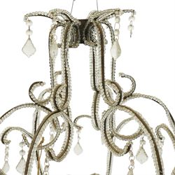 Contemporary decorative hanging chandelier frame, openwork painted metal scroll frame, with applied clear bead borders and hanging faceted glass pendants