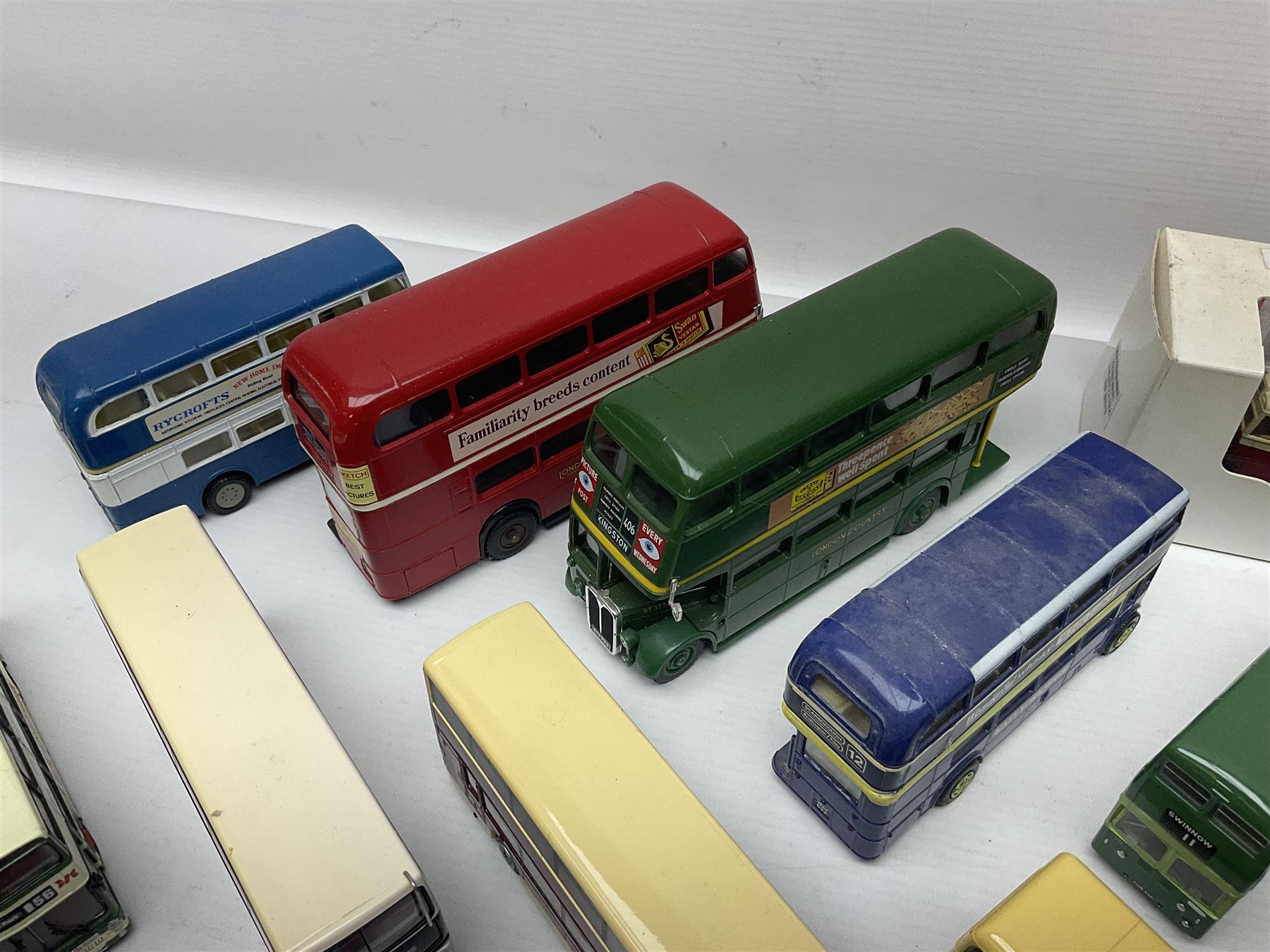 Thirty-one modern die-cast models of buses, coaches and trams by Corgi, EFE, Solido etc; predominantly unboxed but one in box