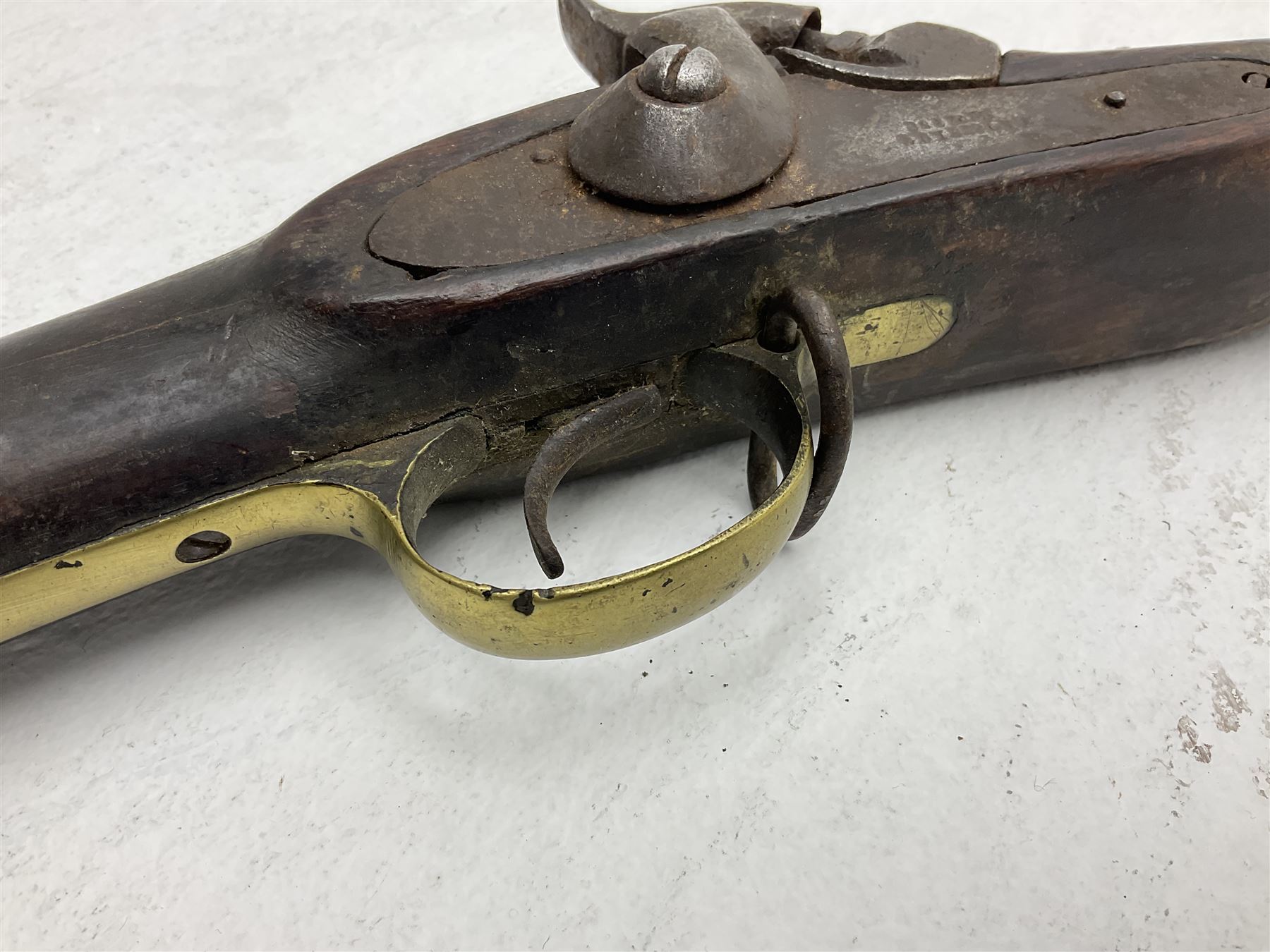 20th century Indian percussion musket, the 76cm barrel with two bands, indistinctly inscribed lock-plate, walnut full stock stamped 642 with brass butt and trigger guard and under barrel ramrod channel L121cm overall