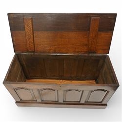 Late 19th century Gothic Revival oak coffer, the plain hinged top over four fielded arch moulded panels, the sides panelled and raised on a block plinth, the interior with vertical boarding and later iron hinges