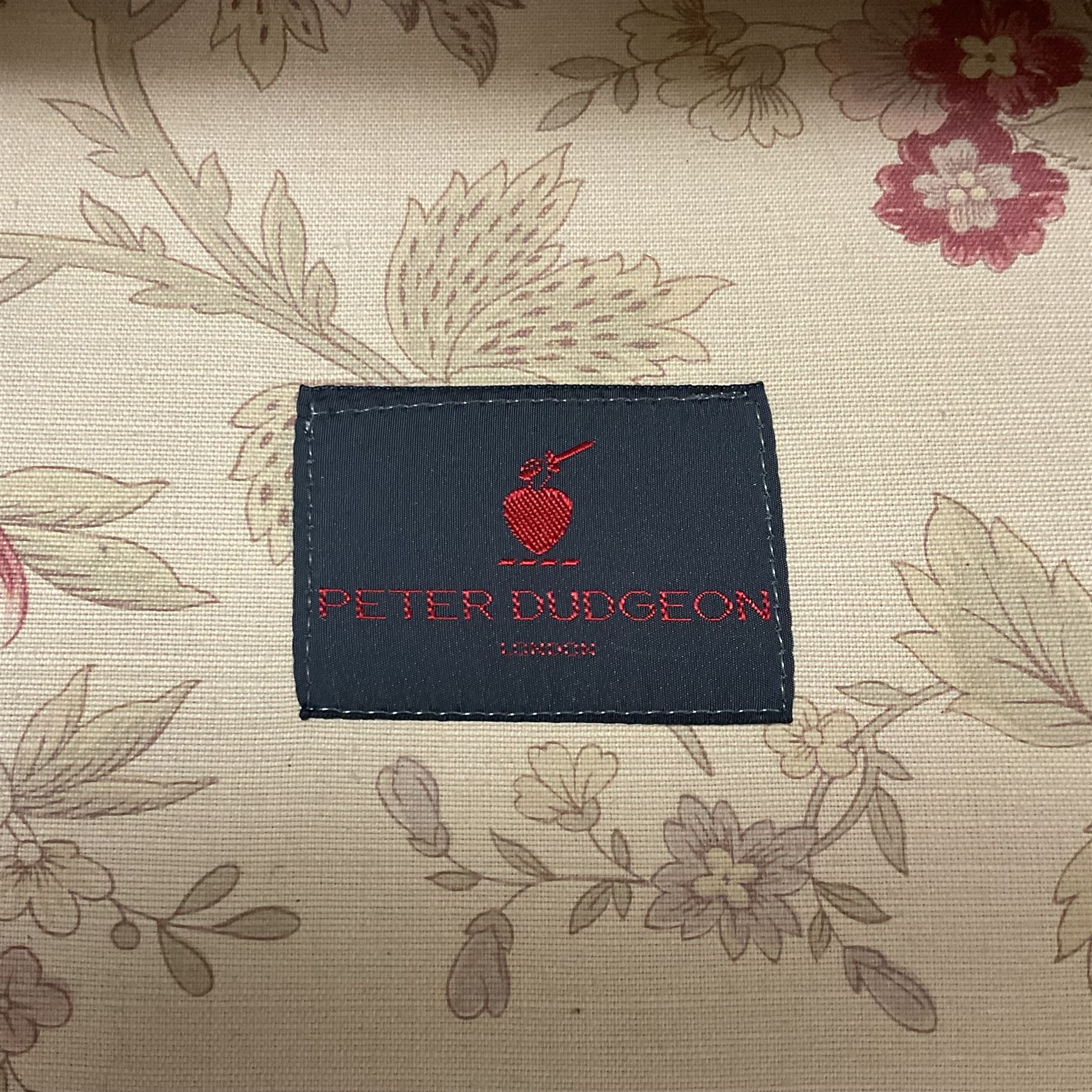 Peter Dudgeon - Georgian design mahogany framed armchair, shaped cresting rail over sprung back and seat flanked by rolled arms, upholstered in floral patterned fabric with matching seat cushion, on square supports joined by stretchers
Provenance: From the Estate of the late Dowager Lady St Oswald