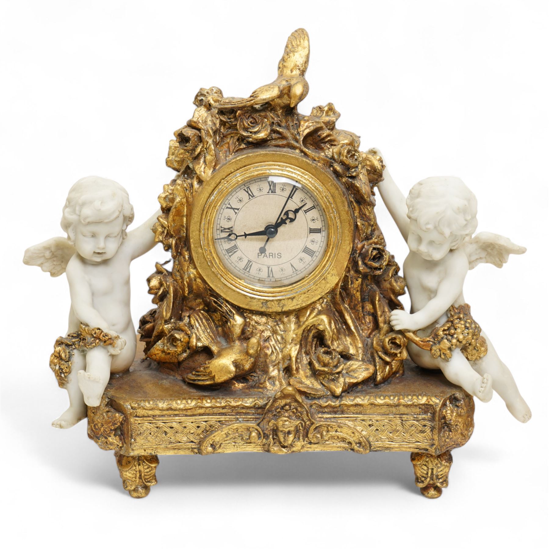 20th century clock garniture with musicians and putti, the gilt composite Italian clock with battery operated quartz mechanism, garnitures H34cm 