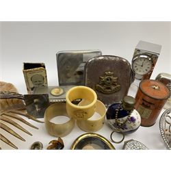 A group of assorted collectables, to include small oval purple guilloche enamel frame, WWII matchbox holder depicting Winston Churchill, Halcyon Days enamel box, Ronson table lighter, ebonised glove stretchers, ivory napkin ring, mother of pearl handled button hook, engine turned cigarette case, etc. 