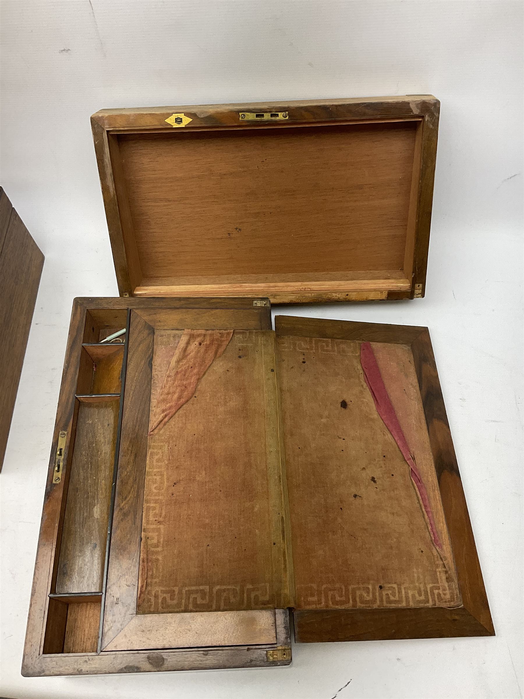 Early 20th century oak canteen box, the hinged lid decorated with marquetry banding and brass shield shaped plaque lifting to reveal red lined interior with lift out tray,  together with a walnut writing slope for restoration, largest L41cm, H44.5cm D33cm