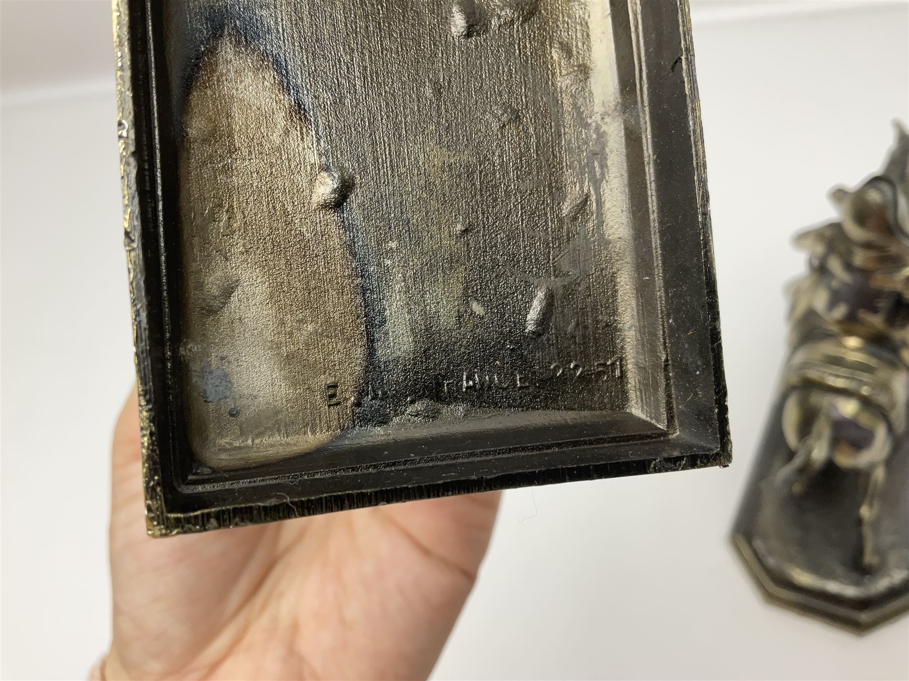 Two figures of Napoleon on horseback, one example standing on octagonal bases marked 'G R France' indistinctly signed, the other on a rectangular base, H19cm 