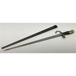 French 1874 pattern epee gras bayonet, the 52cm piped back steel blade inscribed 'Mre. d'Armes de St. Etienne 1879', in steel scabbard
