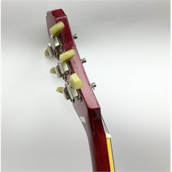 1980s Les Paul Epiphone limited edition cut-away electric guitar by Gibson, the burgundy coloured body with two pick-ups, volume and tone knobs and scratch plate, original tuning pegs, serial no.U6030215, 101cm overall; in modern Kinsman fitted carrying case