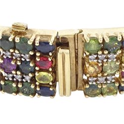 9ct gold sapphire, ruby and diamond bracelet, vari-cut blue fancy coloured sapphires, oval cut rubies and round brilliant cut diamonds, Birmingham 2006