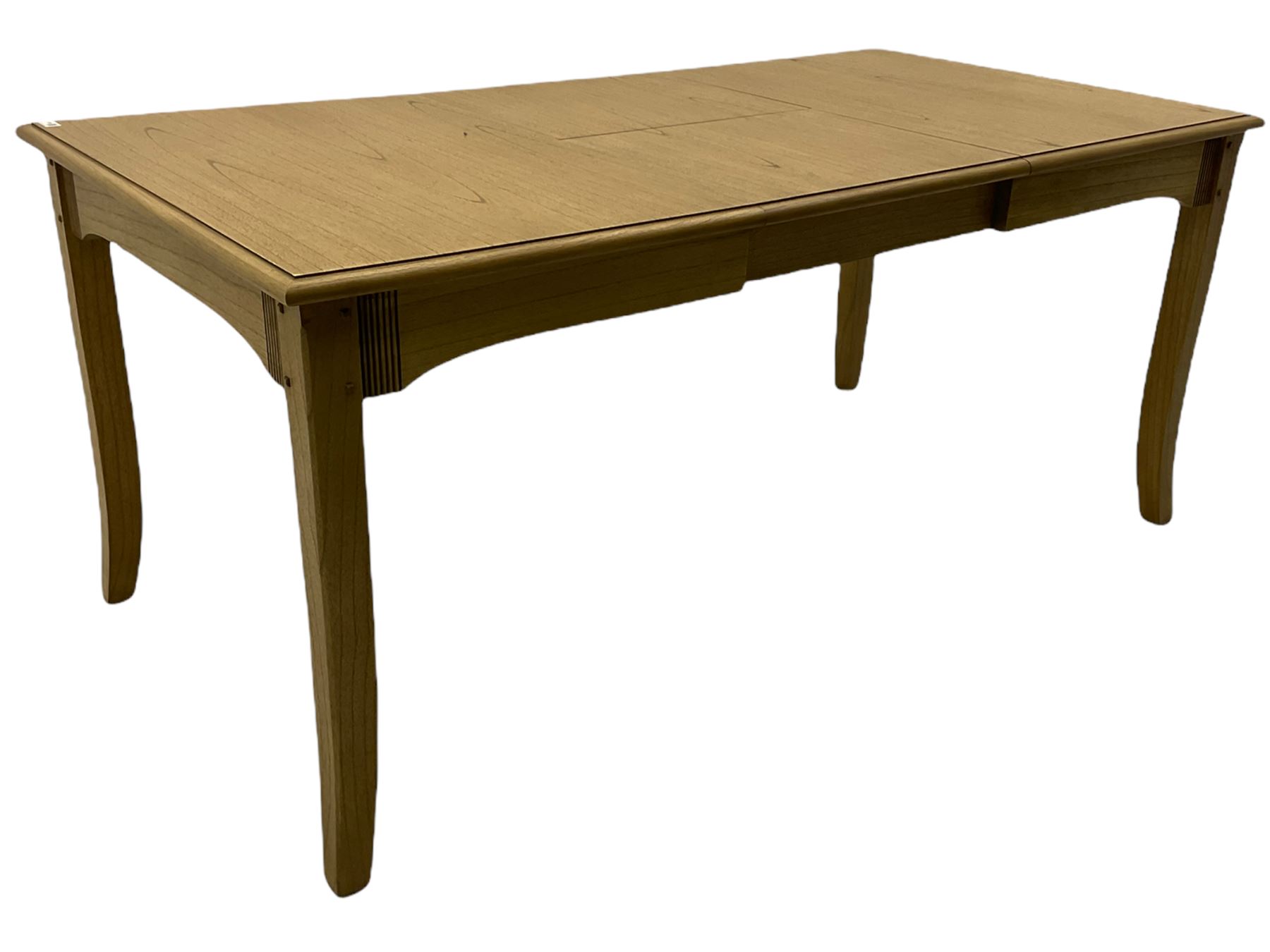 Windsor by Mark Devany oak rectangular extending dining table, with butterfly leaf, and four chairs with upholstered seats and backs