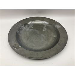 Group of seven 19th century pewter chargers, each of circular form with dished centre, two examples with touch marks verso, each approximately D39cm