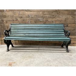 Early 20th century slatted garden bench with scrolling cast iron bench ends