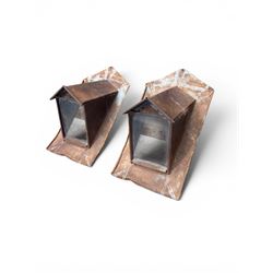 Pair of metal sloping roof lanterns with glazed windows