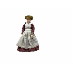 Heidi Ott doll in tartan dress, navy floral dress with white lace and ribbon detailing, striped blue and white dress and a 'Head to Toe' book