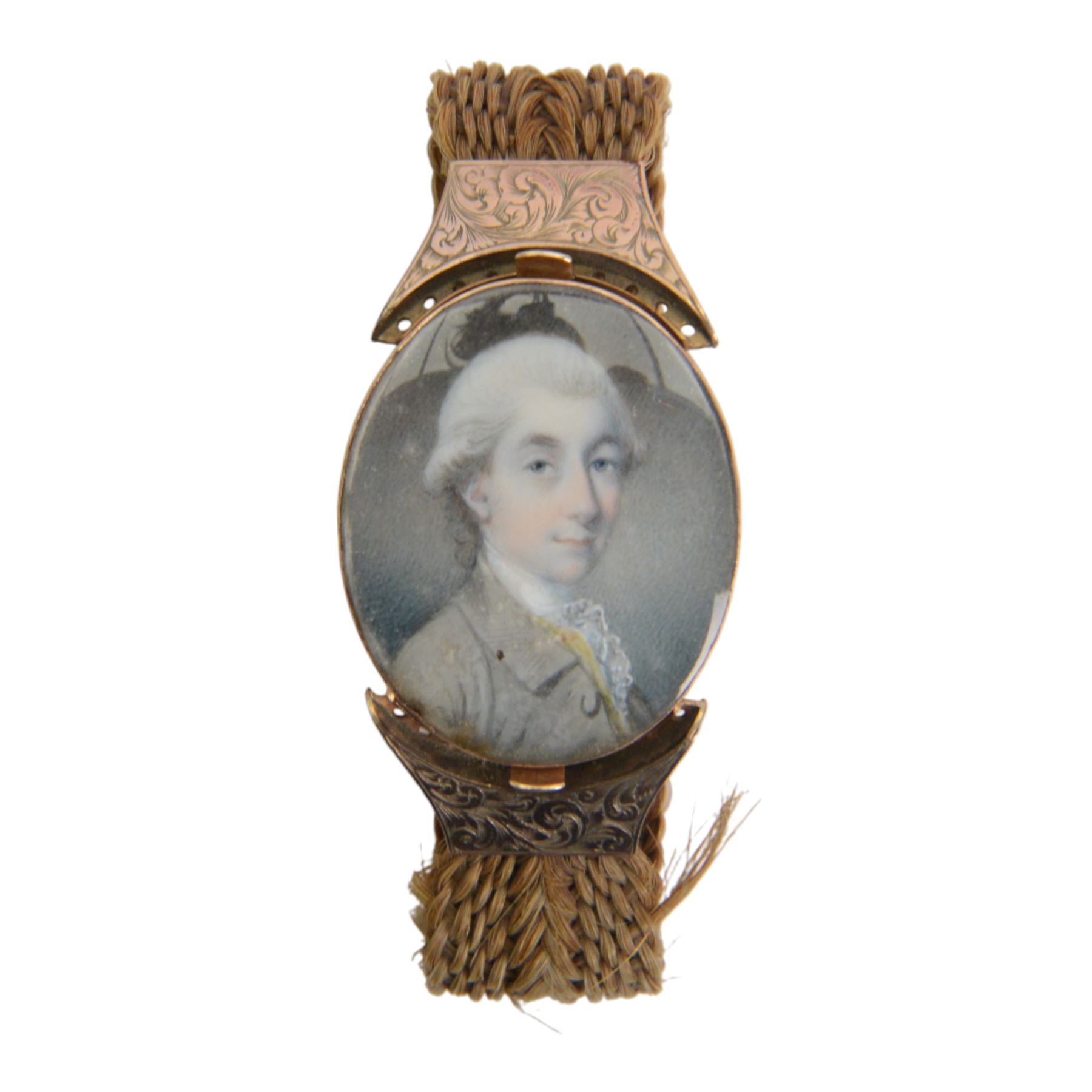 English School (18th century)
Portrait miniature upon ivory
Head and shoulder portrait of Henry Chichester (1724–1799) of Northcote, Devon, and Northover, Somerset, wearing grey coat and white cravat 
Within period gold plated frame, and hairwork strap with foliate engraved gold plated mounts
Oval 3.5cm x 3cm

Provenance: By family descent from the Chichesters of Arlington Court, Devon; from the collection of Andrew Chichester Everitt.

This lot has been registered for sale under Section 10 of the APHA Ivory Act