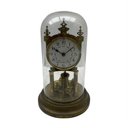A 20th century rotary pendulum torsion clock under a glass dome with a 400-day movement and rotary four-ball pendulum, mounted on a circular brass base with two pillars, steel spade hands, painted steel dial with Arabic hours and minute track, decorated with garlands of flowers, 


