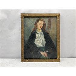 Jean Thompson (British mid 20th century): Half length Portrait of a Young Woman, oil on canvas laid on board unsigned, artist's address '80 Bebington Rd. Birkenhead' verso 47cm x 37cm