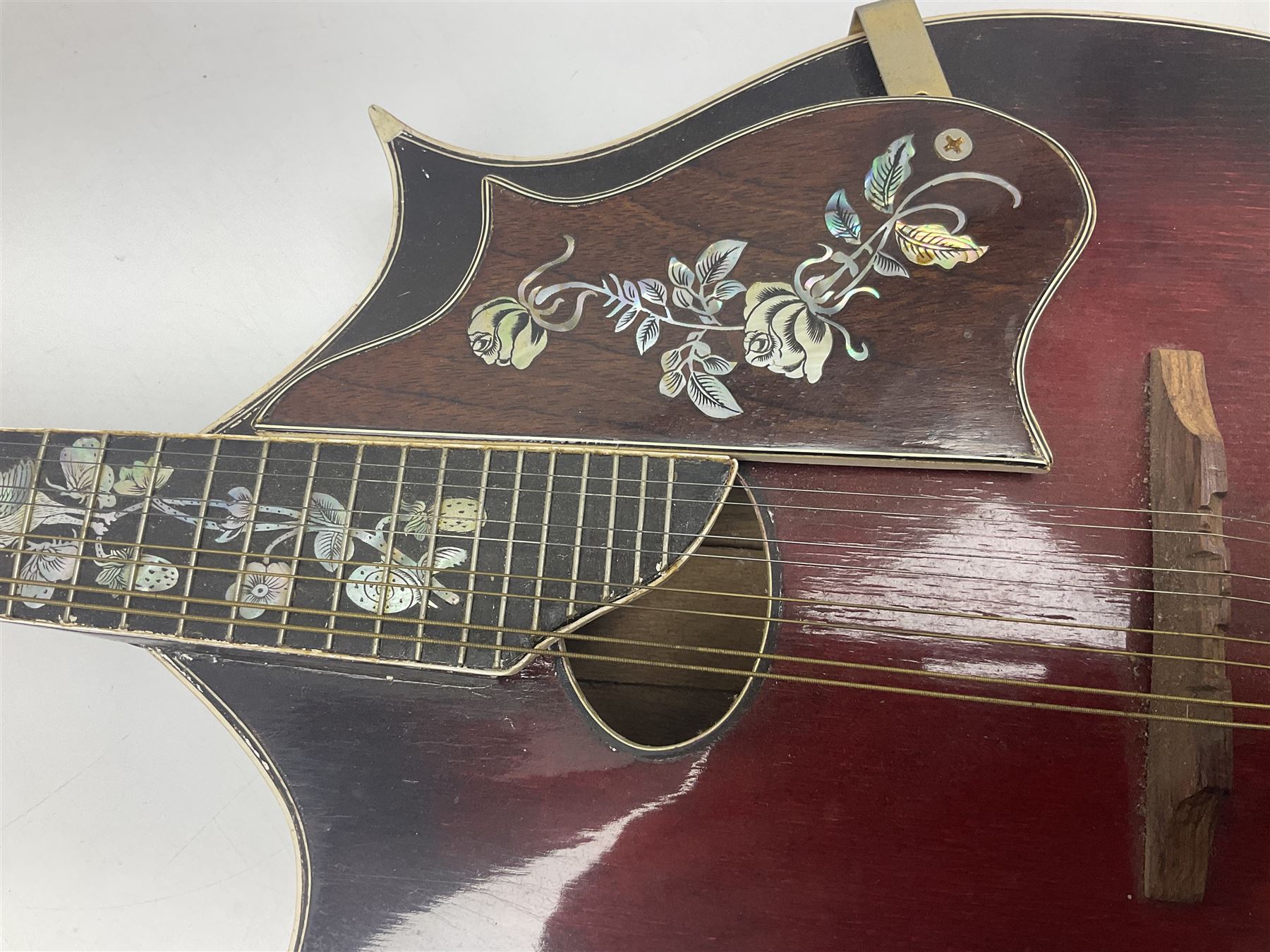 Eastern eight-string mandolin with sunburst finish and mother-of-pearl inlay L68.5cm; and another Harmony mandolin with cracked headstock (2)