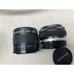 Olympus OM-2 camera body, serial no 1117526, with Olympus OM-System Zuiko Auto-W 28mm 1:2.8'  lens serial no 336591, Olympus OM10 camera body serial no 2392257, with Olympus OM-System Zuiko Auto-Macro 50mm 1:3.5' lens serial no 225784, Soligor C/D mirror lens 1:8 f=500mm' serial no 784035650 together with other camera equipment 