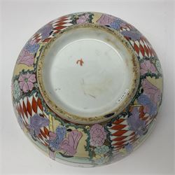 Chinese Qing Dynasty bowl, decorated in polychrome enamels with figures and courting couples, bordered by flower heads upon a gilt ground, with red cross mark beneath, D30.5cm