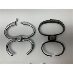 Police - two pairs of steel nipper handcuffs, one stamped Hull City Police; two other chromium plated Hiatt steel nipper handcuffs, each stamped HCP (?Hull City Police); and a pair of chromed steel articulated handcuffs stamped WRC (?West Riding Constabulary) (5)