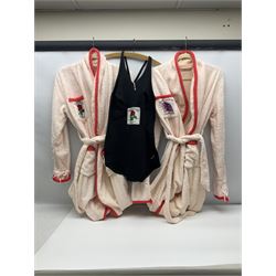 On the direct instructions of Anita Porter nee Lonsbrough Great British Olympic and Commonwealth Games gold medal winning swimmer - collection of early and international memorabilia comprising original Huddersfield Bath Club track suit top bearing eight stitched on cloth badges including British Empire & Commonwealth Games 1958 England Team, YSASA, North Eastern Counties ASA, ESSA Division 3,  English Schools Swimming Association winner etc
The swimming costume Anita wore at the 1958 Commonwealth Games in Cardiff, her first major championships, where she won two gold medals. The grey elastic on the sides, in those days, she would use to make it tighter and more streamlined.
Blue track suit from the 1960 Olympics which she wore on the podium receiving the gold medal.
1960 pool side towelling robe used at the Rome Olympics (interesting to note her name is spelt wrong on the embroidered label).
1962 Commonwealth Games pool side towelling robe used in Perth Australia when winning three Gold medals. 
It was also this year she became BBC Sports Personality of the year, the first female to do so.
Her 'lucky' pool side towel which she took with her to every event she competed in and which can be seen round her neck in many official celebratory photographs. Copies of some of these photographs are included for identification.
In addition there are two souvenir programmes of an evening event to honour Anita at The Theatre Royal Huddersfield and she has kindly signed the front cover on one of these.