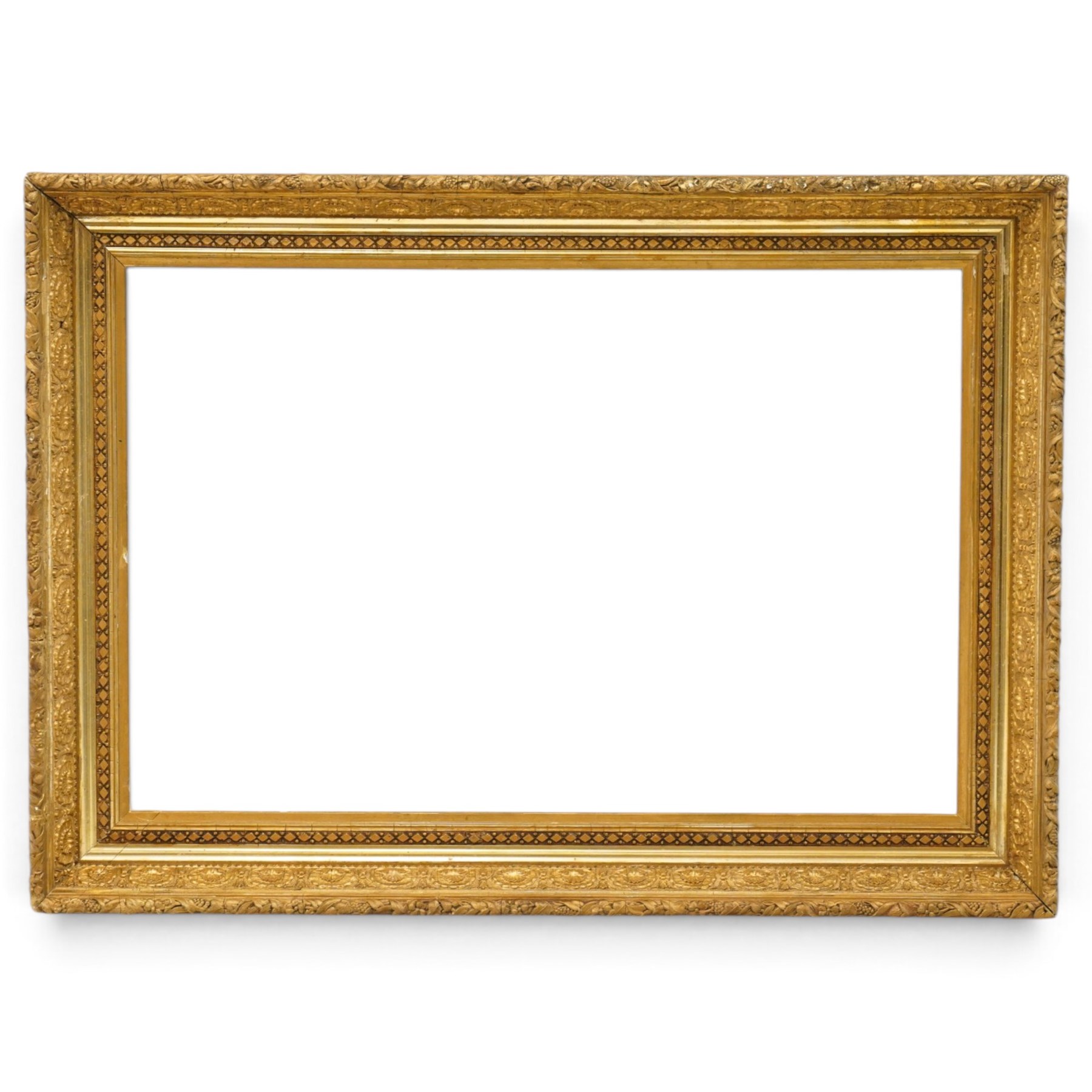 FRAMES - 20th century ornate gilt wood frame, featuring moulded flowers and foliage, aperture 77cm x 51cm, overall 95cm x 68cm