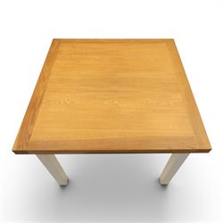 Contemporary Oak fold-over leaf dining table and four chairs, square top extending to a rectangular top 200cm, four white dining chairs with upholstered and padded seats