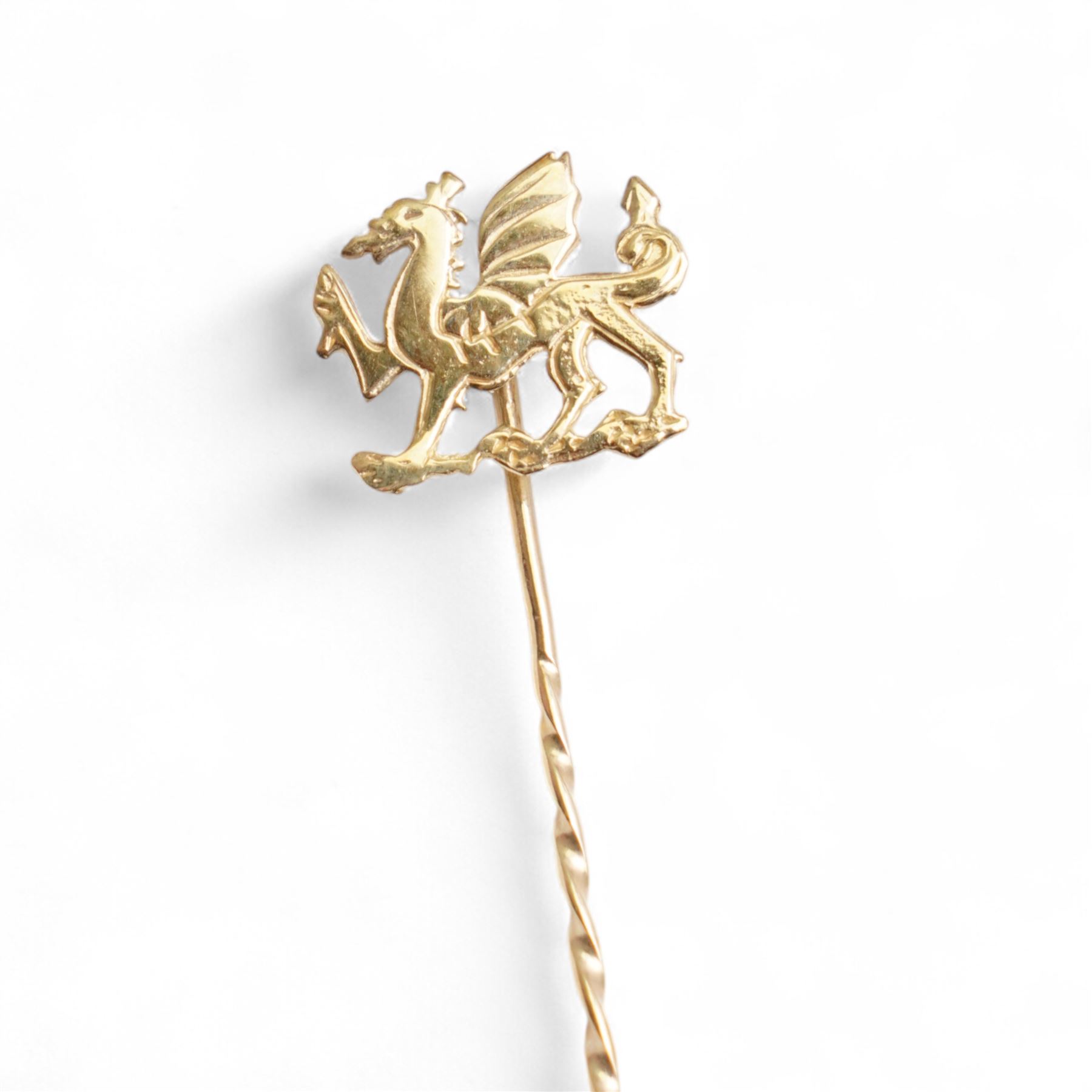 Victorian gold garnet brooch, with glazed back, 9ct gold blue stone set brooch and a 9ct Welsh Dragon pin