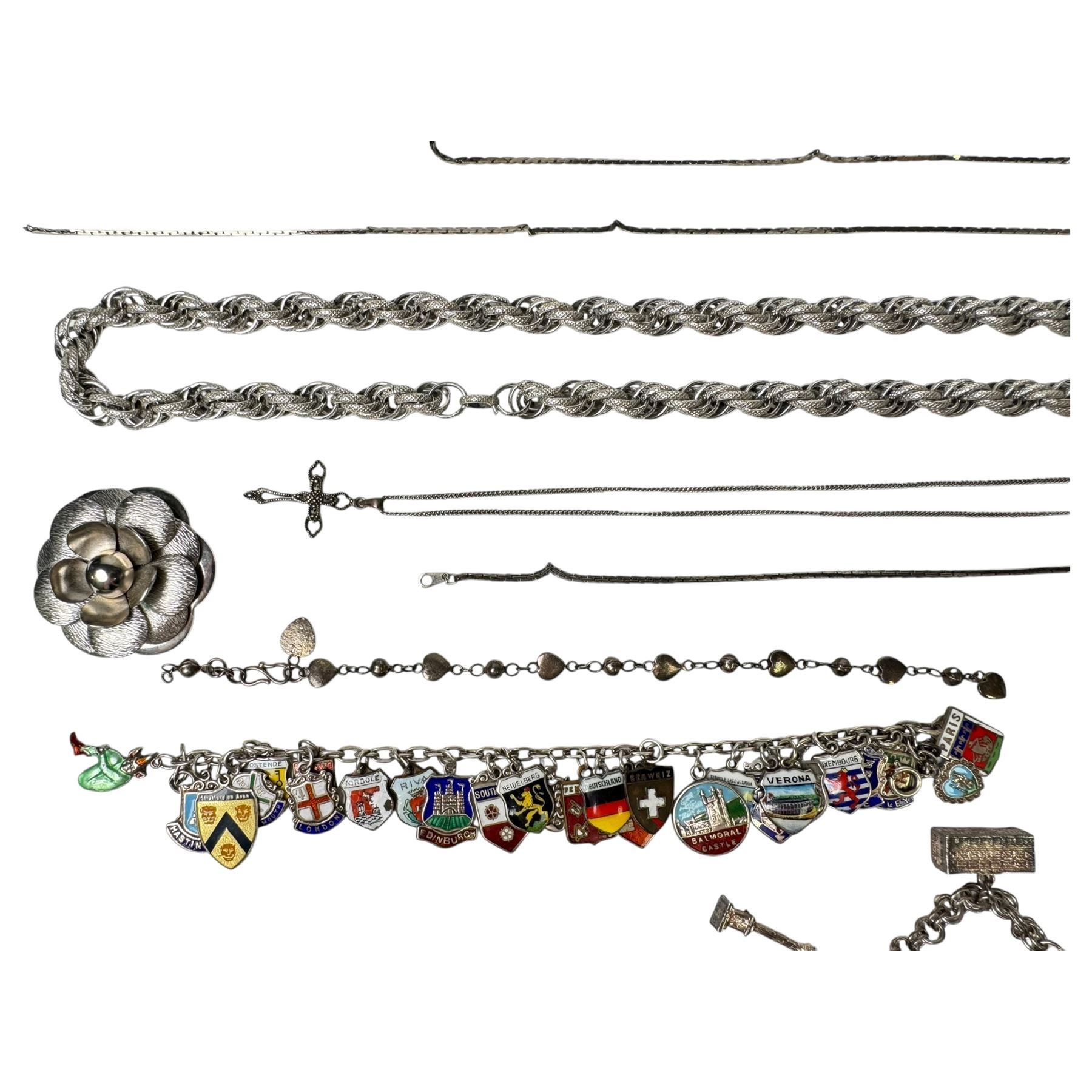 9ct gold stone set ring and silver enamel town badge charm bracelet, cross pendant, ring and heart link bracelet, and a collection of costume jewellery