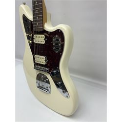 Mexican Fender Jaguar electric guitar with Humbucker pick-ups and tremolo arm, serial no.MX16741977, L101cm; in soft carrying case