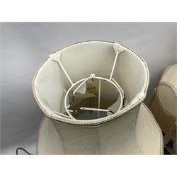 Two Giuseppe Armani figural lamps, the first modelled as an owl perched upon a book, the second modelled as a pair of owls perched upon blackberry branch, each with damask fabric tassel shades, tallest H76cm