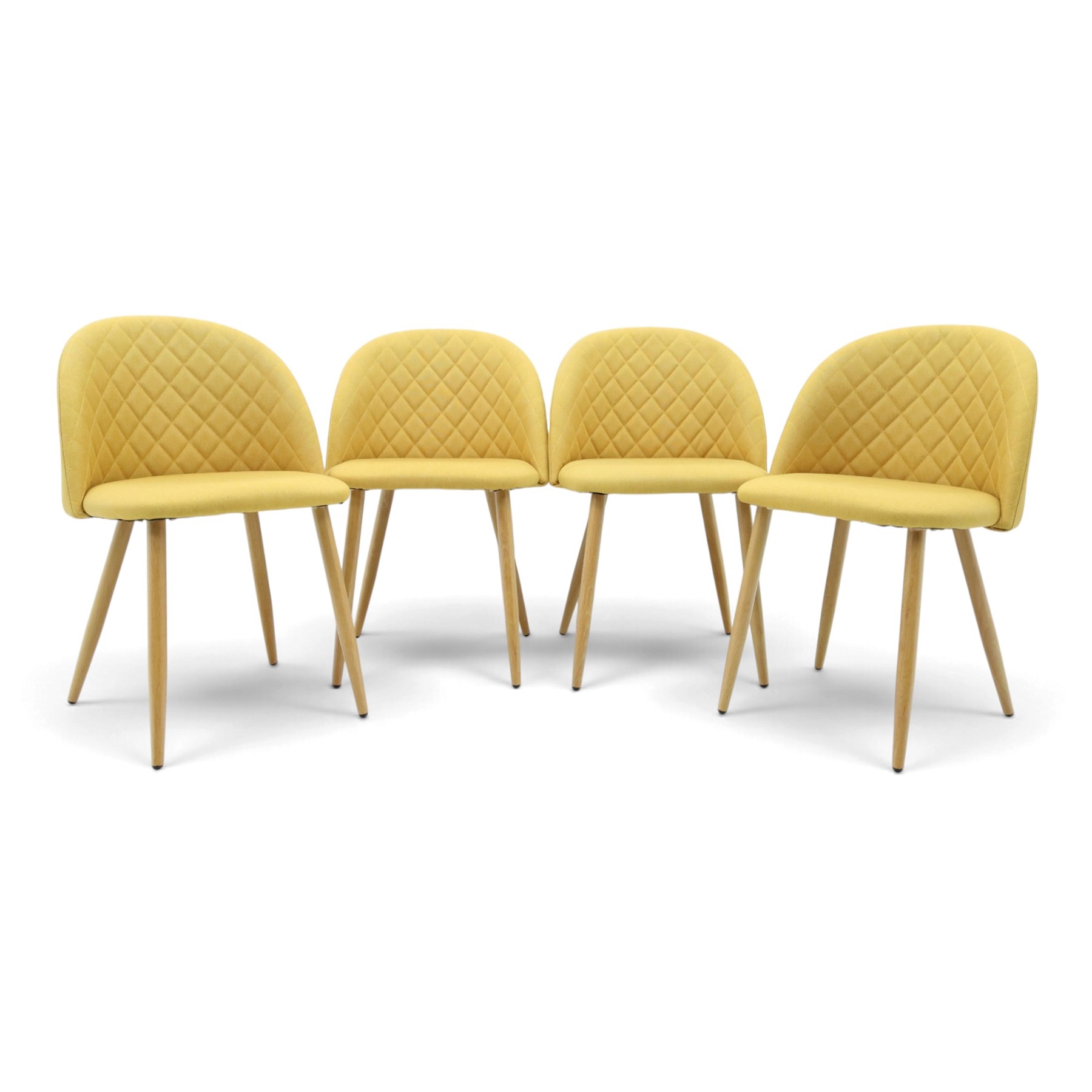 Set of four contemporary yellow upholstered dining chairs, with wrap around back with quilted stitching, padded seat raised on light oak tapering supports 