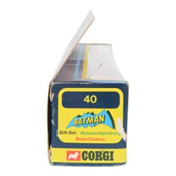 Corgi Batman Gift Set no. 40, comprising Batmobile, Batcopter, Batboat on trailer and twelve yellow plastic missiles on sprue, in original window box with pictorial header card and polystyrene interior, with outer cardboard protector