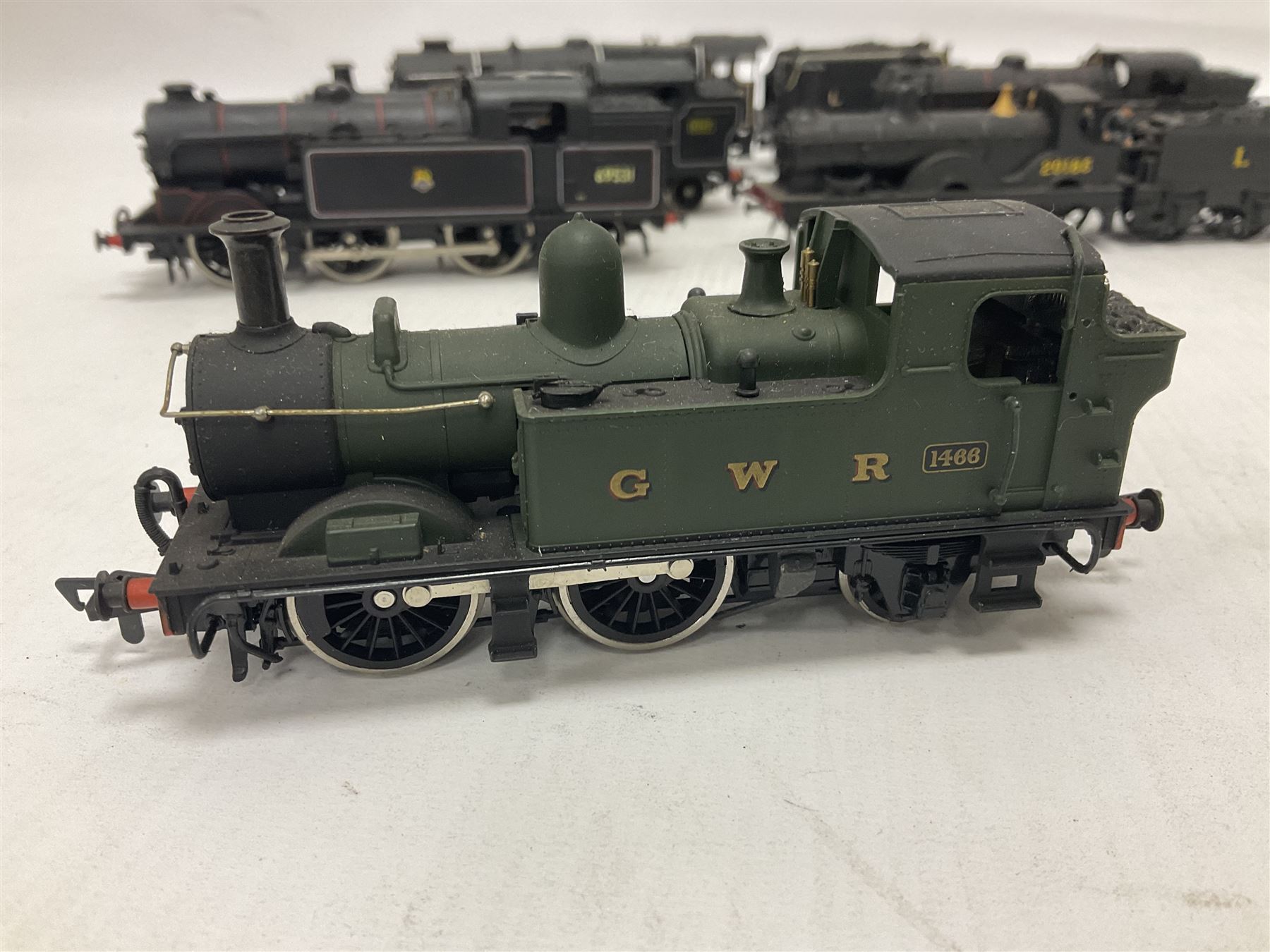 Airfix ‘00’ gauge - seven locomotives comprising Class 7P (Royal Scot) ‘Royal Scots Fusilier’ 4-6-0 no.6103 in LMS black with Mainline tender; two Class N2 0-6-2T no.69531 in BR black; Class 1282 2-4-0 no.20185 in LMS black; Class 61XX 2-6-2T no.6167 in BR black; Class 14XX 0-4-2T no.1466 in GWR green, all unboxed; Class 4F 0-6-0 no.4454 in LMS black, in original box (7)