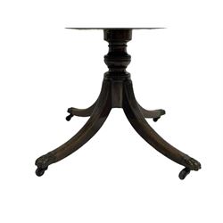 George III mahogany breakfast table, the oval top with a kingwood band and boxwood stringing, raised on a turned vasiform pedestal terminating in a fluted sabre tripod base with hairy paw feet and castors
