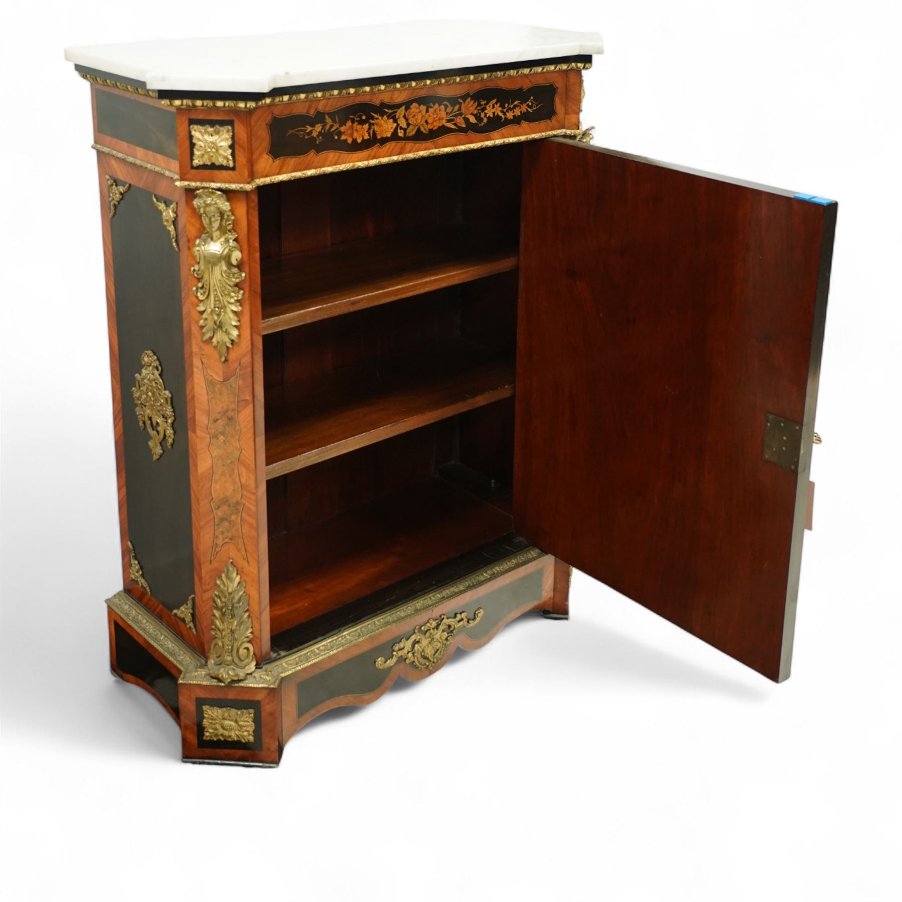 Late Victorian floral marquetry and ormolu mounted side cabinet, with white marble top above a frieze of floral inlay, single cupboard door revealing a shelved interior, with central floral bouquet panel within gilt-bronze border, flanked by gilt metal mounts of female masks and scrolls, on shaped plinth base