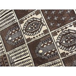 Mid-20th century Persian Bakhtiari rug, ivory ground with alternating dark brown and ivory panels featuring geometric and floral designs, bordered by a plain ivory band