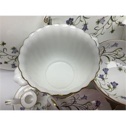 Large collection of Spode Campanula pattern ceramics, to include two cake plates, candle stick, vases bowls, planter, covered bon bon dish etc, many with boxes 
