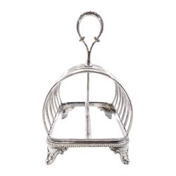 Victorian silver seven bar toast rack, of curved form with central ring handle, the handle and base with beaded detail, upon four scrolling feet, hallmarked Samuel Whitford II, London 1863, maximum H16.5cm L16.5cm, weight 12.86 ozt (400 grams)