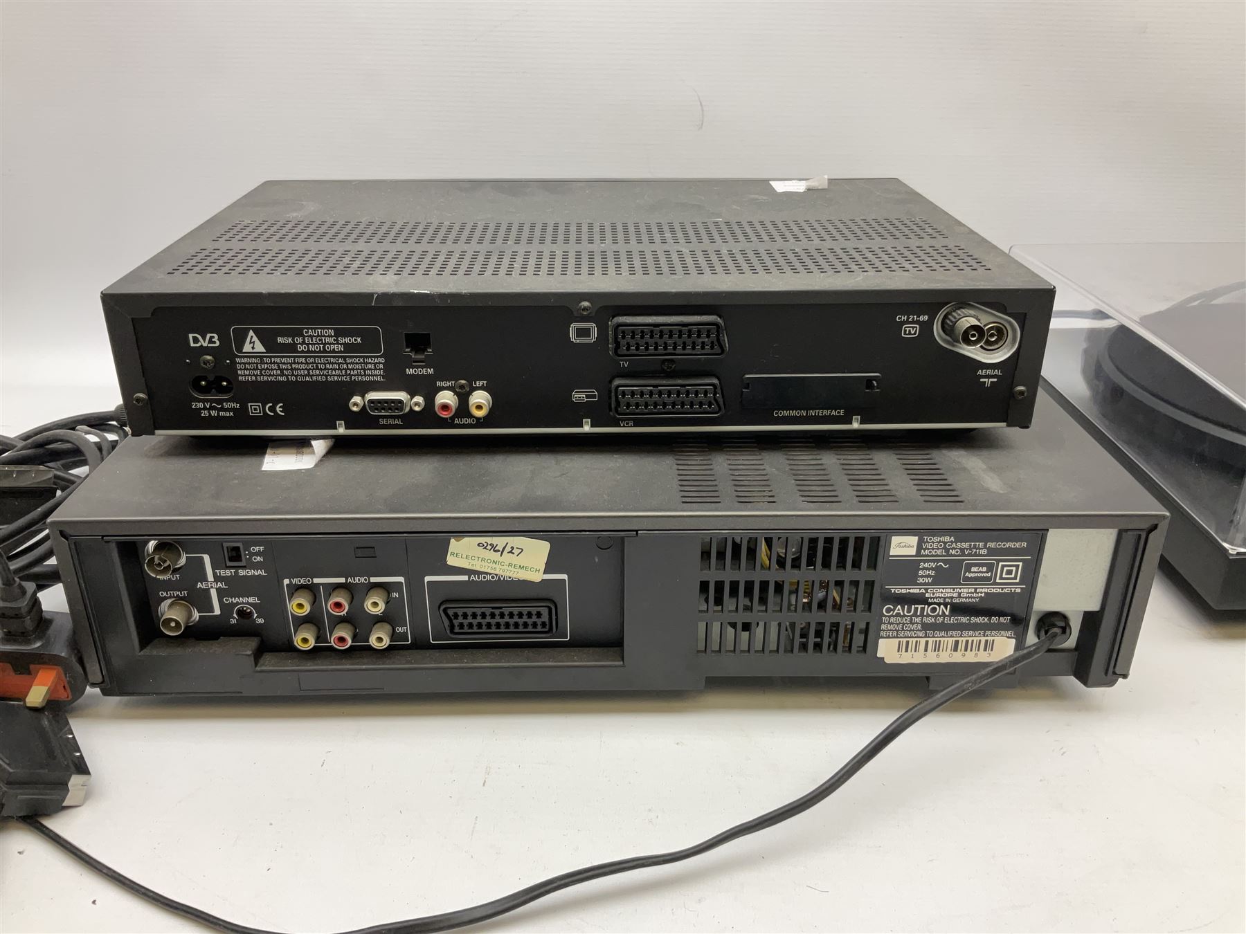 Two VHS video cassette recorders comprising Sharp VC-M312 and Hitachi F645E, together with Philips Digital Terrestrial Receiver, Toshiba VHS 4Head and a record player