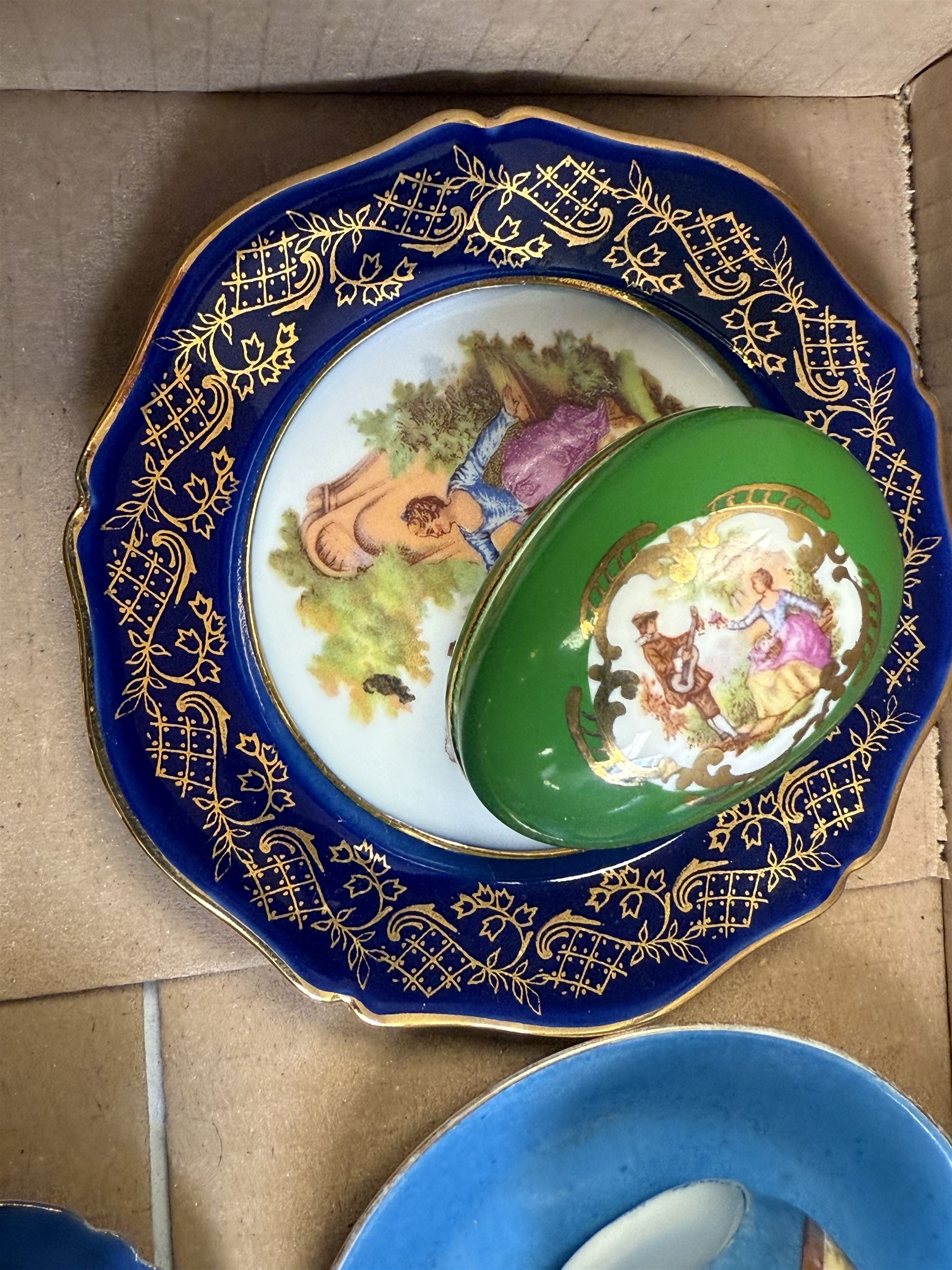 Collection of miniature Limoges and similar porcelain, including teacups and saucers, vases, comports, etc