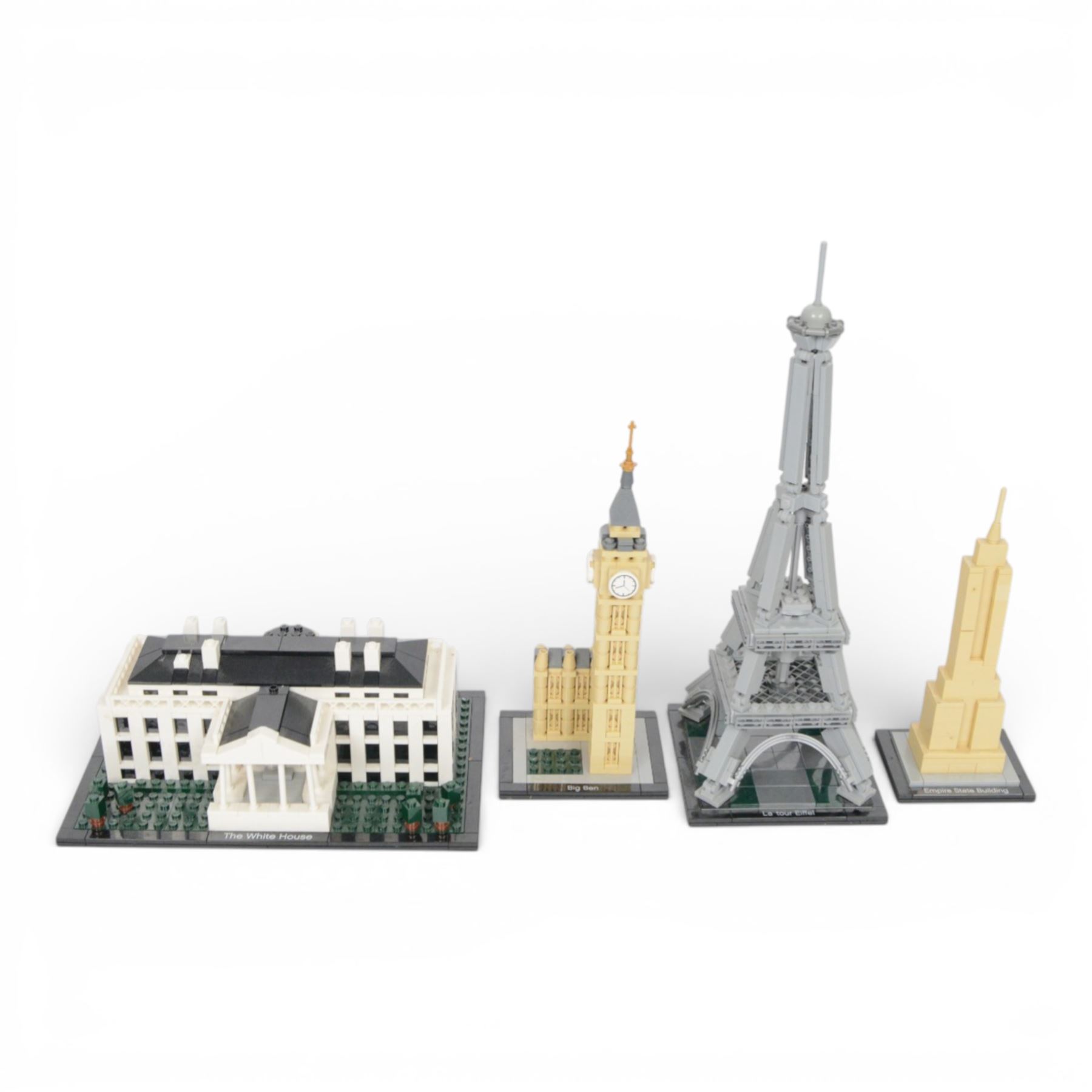 Four Lego architecture sets, comprising Empire State Building, The Eiffel Tower, Empire State Building and Big Ben, built with instructions, White House with box, tallest H33cm