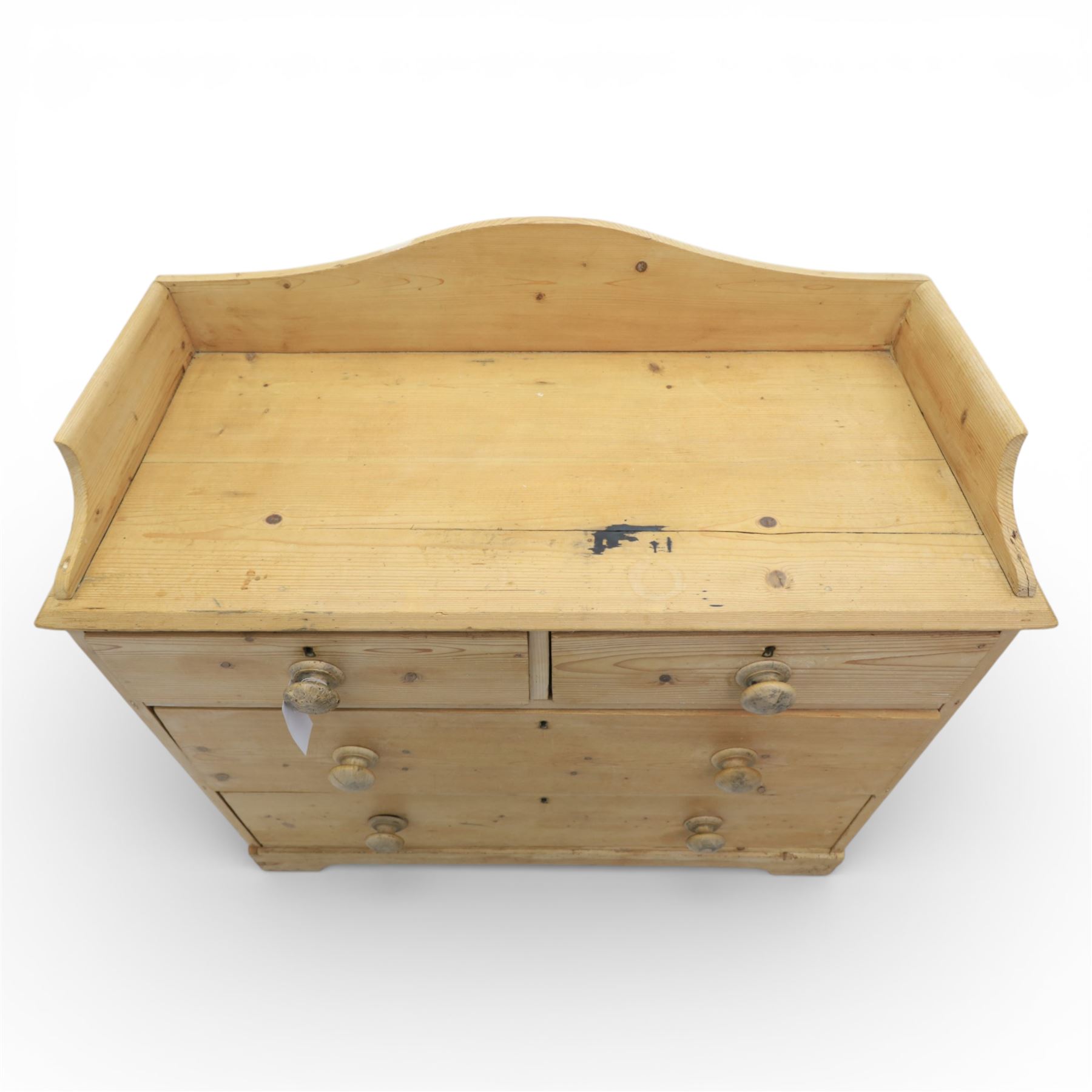 20th century pine chest of drawers, shaped galleried top, above two short over two long drawers, raised on bracket feet
